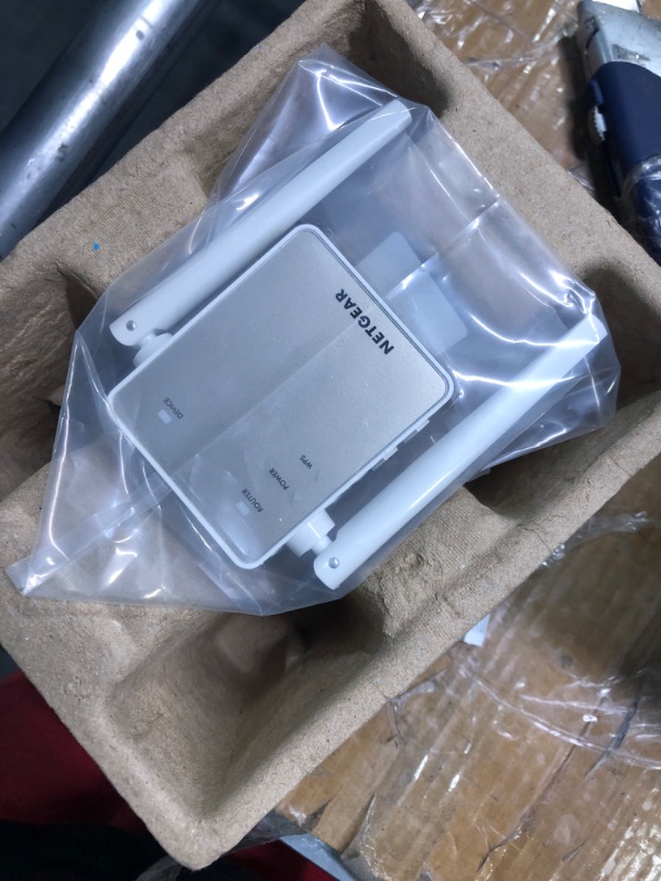 Photo 1 of NETGEAR Wi-Fi Range Extender EX6120 - Coverage Up to 1500 Sq Ft and 25 Devices with AC1200 Dual Band Wireless Signal Booster & Repeater (Up to 1200Mbps Speed), and Compact Wall Plug Design WiFi Extender AC1200