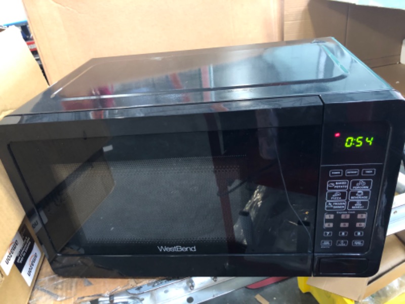 Photo 4 of West Bend WBMW71B Microwave Oven 700-Watts Compact with 6 Pre Cooking Settings, Speed Defrost, Electronic Control Panel and Glass Turntable, Black