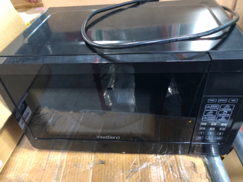 Photo 3 of West Bend WBMW71B Microwave Oven 700-Watts Compact with 6 Pre Cooking Settings, Speed Defrost, Electronic Control Panel and Glass Turntable, Black