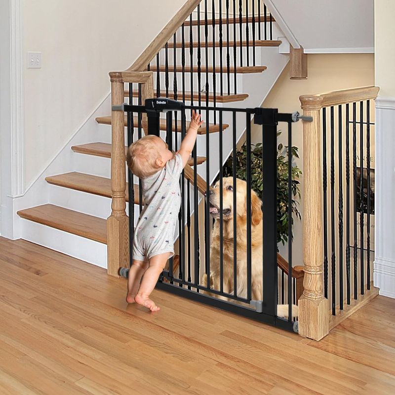 Photo 1 of BABELIO 26-40 Inch Easy Install Extra Wide Pressure Mounted Metal Baby Gate, No Drilling, No Tools Required, with Wall Protectors and Extenders (Black)
