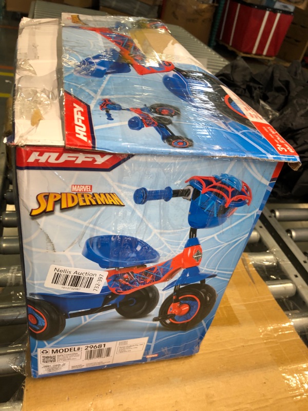 Photo 2 of Huffy Marvel Spider-Man 3 Wheel Preschool Training Tricycle with Steel Frame, Storage Basket, Red & Blue