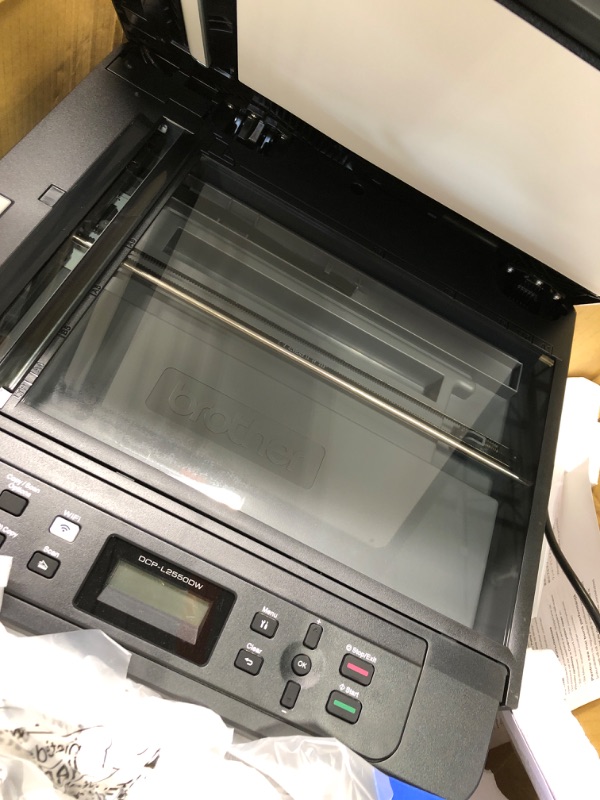 Photo 3 of POWERS ON. GLASS IS INTACT. UNABLE TO TEST OTHER FEATURES

Brother Monochrome Laser Printer, Compact Multifunction Printer and Copier, DCPL2550DW, Refresh Subscription and Amazon Dash Replenishment Ready, Black New Model: DCPL2550DW