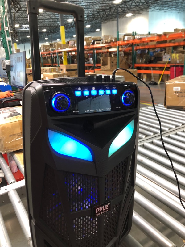 Photo 1 of Pyle Portable Bluetooth PA Speaker System-600W 10” Indoor/Outdoor BT Speaker-Includes 2 Wireless Microphones, Party Lights, USB SD Card Reader, FM Radio, Rolling Wheels-Remote Control PPHP101WMB