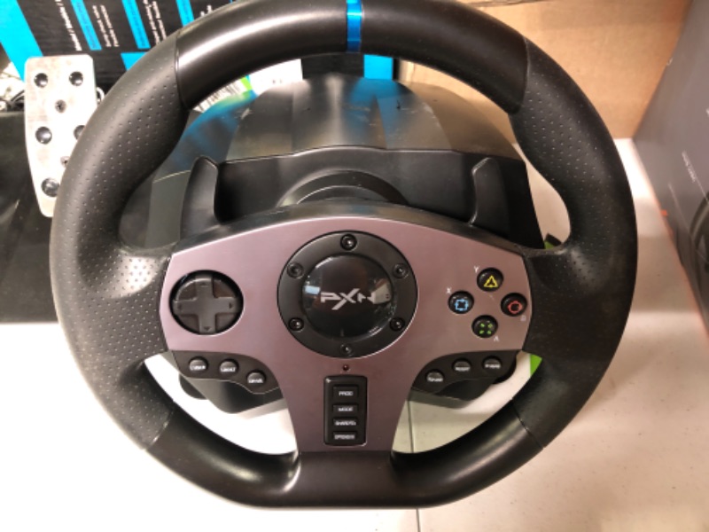 Photo 1 of PXN Game Racing Wheel, V9 270°/900° Adjustable Racing Steering Wheel, With Clutch and Shifter, Support Vibration and Headset Function, Suitable For PC, PS3, PS4, Xbox One, Nintendo Switch.