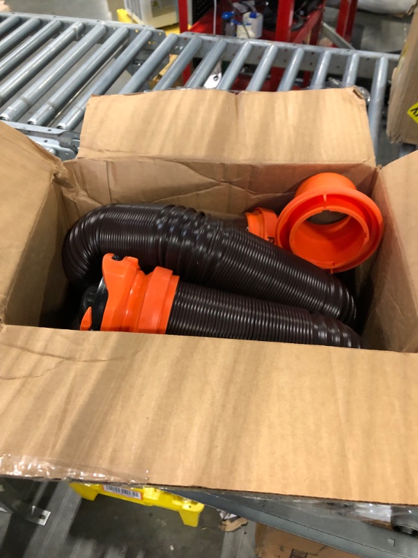 Photo 3 of Camco RhinoFLEX RV Sewer Hose Kit with Swivel Transparent Elbow and 4-in-1 Dump Station Fitting, Brown, 15 Feet (39770) 15ft Sewer Hose Kit Frustration-Free Packaging