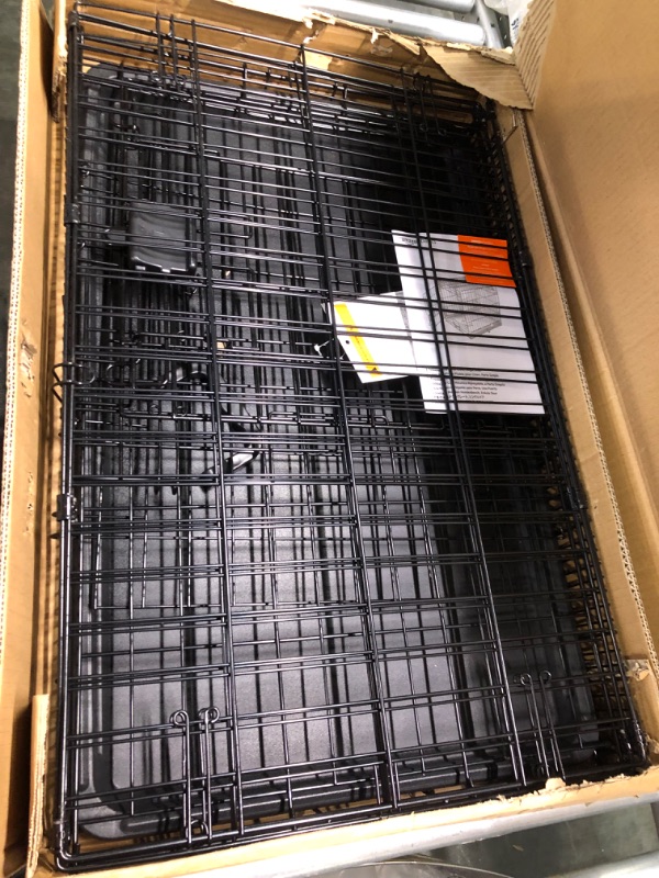 Photo 1 of Amazon Basics Foldable Metal Wire Dog Crate with Tray, Single Door, 24 Inch 24" Single Door w/ Divider Crate