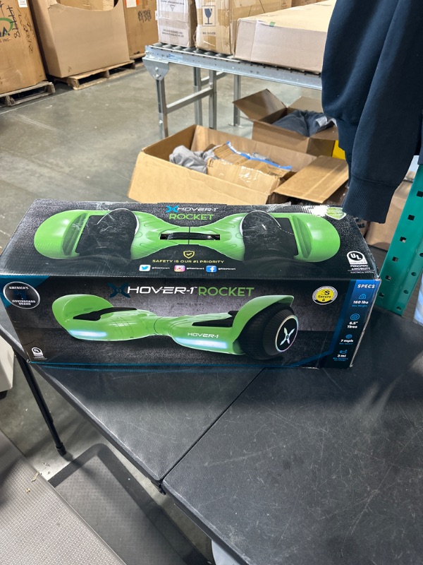 Photo 2 of Hover-1 Rocket Electric Self-Balancing Hoverboard with 6.5” LED Light-Up Wheels, Dual 160W Motors, 7 mph Max Speed, and 3 Miles Max Range Green 1.0