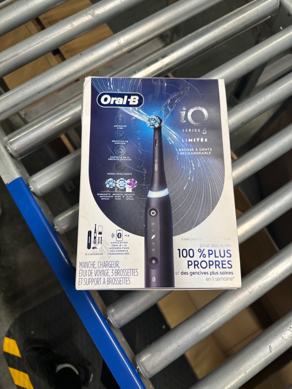 Photo 1 of Oral-B iO Series 5 Limited Electric Toothbrush with (3) Brush Head, Rechargeable, Black Black 1 Count (Pack of 1)
