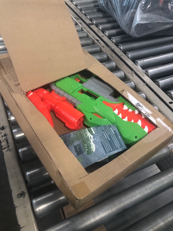 Photo 2 of NERF DinoSquad Rex-Rampage Motorized Dart Blaster, 10-Dart Clip, 20 Official Darts, 10-Dart Storage- T-Rex Dinosaur Design Frustration-Free Packaging