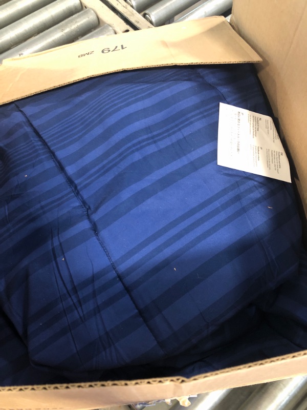 Photo 3 of Amazon Basics Lightweight Microfiber Bed-In-A-Bag 5 Piece Comforter Bedding Set, Twin/Twin XL, Blue Calvin Striped Blue Calvin Striped Twin/Twin XL