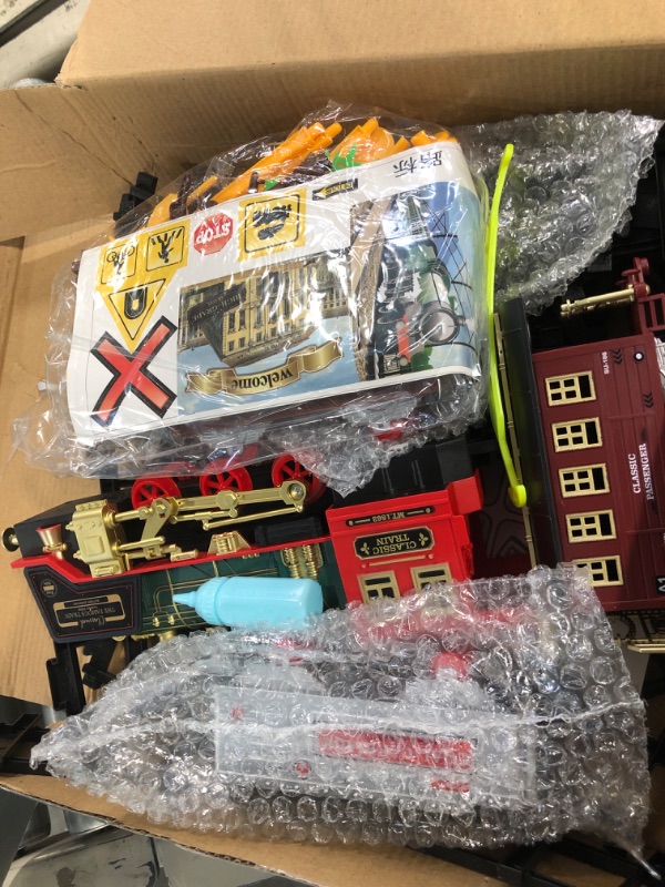 Photo 1 of Christmas Electric Train Set with Steam, Sound & Light, Remote Control Train Toys w/Steam Locomotive Engine, Cargo Cars & Tracks, Toy Train w/Rechargeable Battery for Kids Boys 3 4 5 6 7 8 Year Old