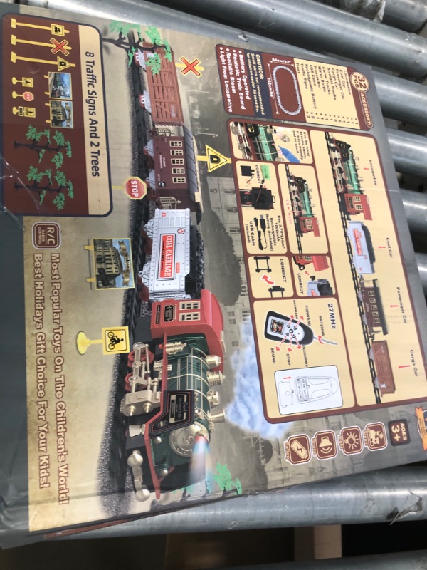 Photo 1 of Christmas Electric Train Set with Steam, Sound & Light, Remote Control Train Toys w/Steam Locomotive Engine, Cargo Cars & Tracks, Toy Train w/Rechargeable Battery for Kids Boys 3 4 5 6 7 8 Year Old