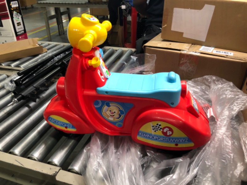 Photo 2 of Fisher-Price Laugh & Learn Smart Stages Scooter, Musical Ride-on Toy with Smart Stages Learning Content for Toddlers Ages 1 to 3 Years & Laugh & Learn Pull & Play Learning Wagon, Ages 6 Months +