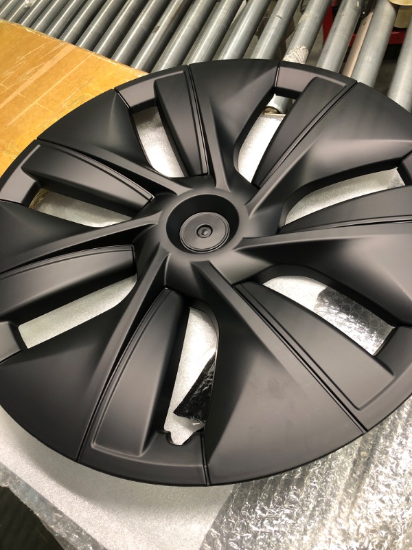 Photo 1 of Limsas Tesla Model Y Wheel Cover Hubcap 19 Inch,Tesla Model Y Accessories, Matte Black Wheel Cover HubCaps Compatible with Tesla Model Y 2021-2023,Hubcaps with Four Logos,Set of 4