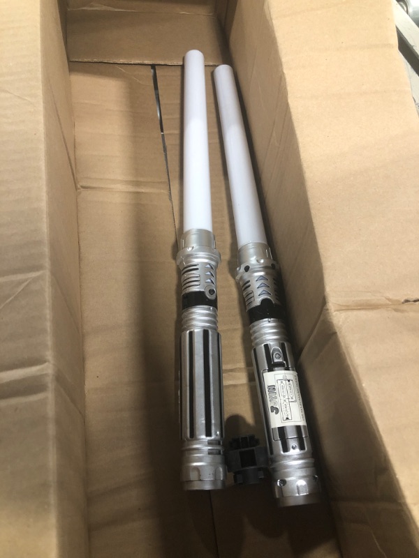 Photo 1 of JOYIN 2-in-1 Light Up Saber, Sword for Kids, LED Dual Laser Swords Set with FX Sound (Motion Sensitive) and Realistic Sliver Handle for Fighters and Warriors, New Years Eve Party Supplies Kids Stuff Green and Blue