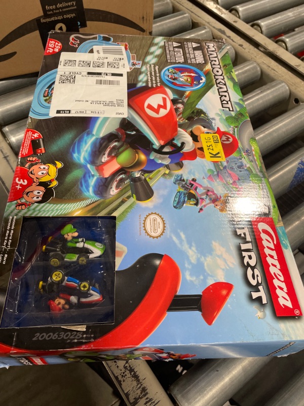 Photo 1 of Carrera First Nintendo Mario Kart Slot Car Race Track - Includes 2 Cars: Mario and Luigi and Two-Controllers - Battery-Powered Beginner Set for Kids Ages 3 Years and Up, 20063028 Mario Kart / Flippers