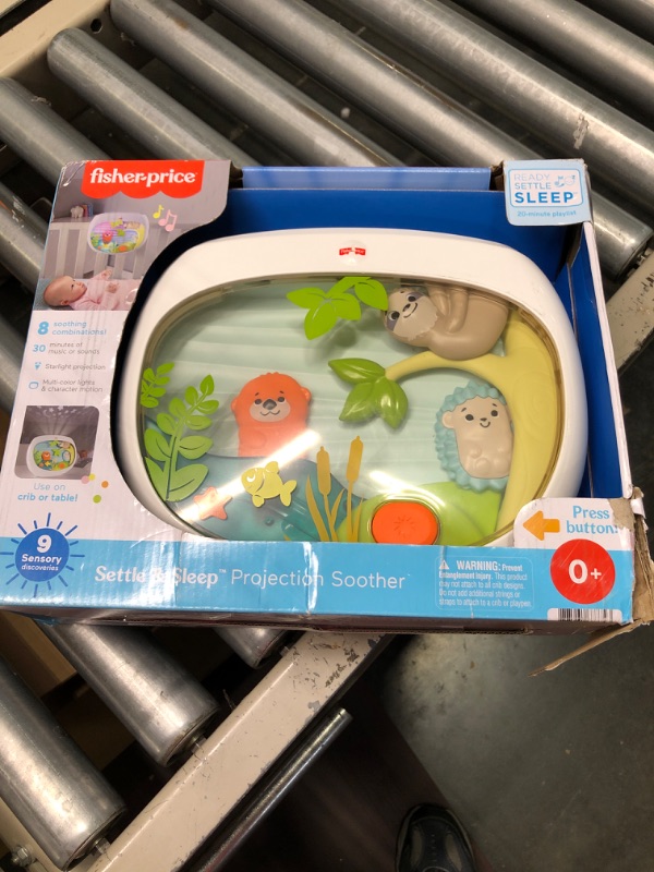 Photo 2 of Fisher-Price Settle & Sleep Projection Soother, Crib-attaching Baby Soother with Gentle Music, Lights, and Moving Animal pals