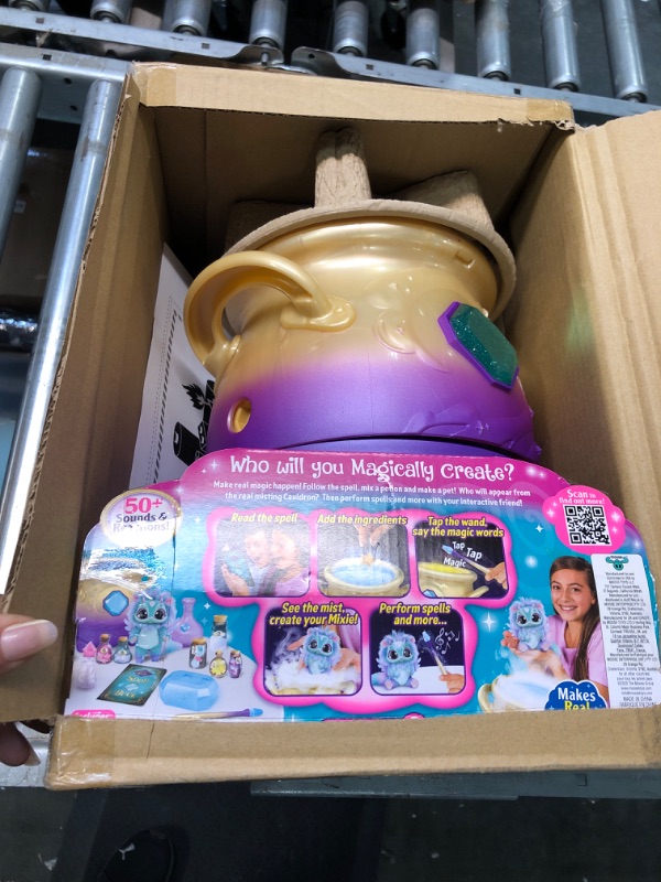 Photo 1 of Magic Mixies Magical Misting Cauldron with Interactive 8 inch Blue Plush Toy and 50+ Sounds and Reactions, Multicolor