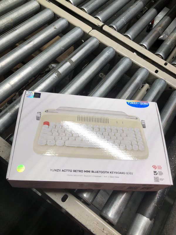 Photo 2 of YUNZII ACTTO B303 Wireless Typewriter Keyboard, Retro Bluetooth Aesthetic Keyboard with Integrated Stand for Multi-Device (B303, Ivory Butter) B303 Ivory Butter