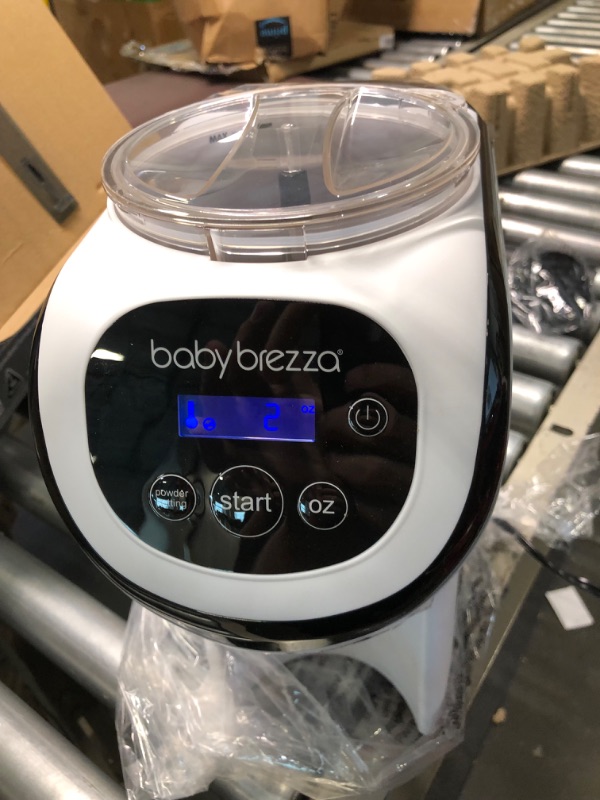 Photo 4 of Baby Brezza Formula Pro Mini Baby Formula Maker – Small Baby Formula Mixer Machine Fits Small Spaces and is Portable for Travel– Bottle Makers Makes The Perfect Bottle for Your Infant On The Go Formula Pro Mini Dispenser Machine