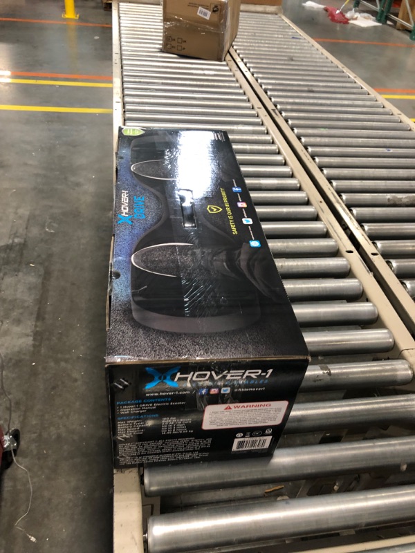 Photo 2 of ***FOR PARTS ONLY*** Hover-1 Drive Electric Hoverboard | 7MPH Top Speed, 3 Mile Range, Long Lasting Lithium-Ion Battery, 6HR Full-Charge, Path Illuminating LED Lights Black