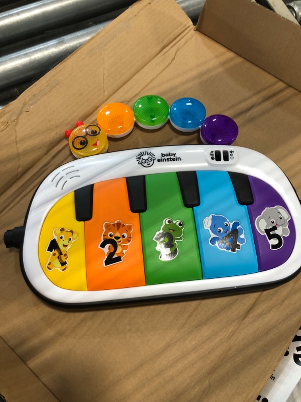 Photo 1 of Baby Einstein 4-in-1 Kickin' Tunes Music and Language Play Gym and Piano Tummy Time Activity Mat