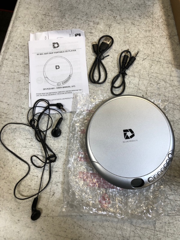 Photo 2 of Deluxe Products CD Player Portable with 60 Second Anti Skip, Stereo Earbuds, Includes Aux in Cable and AC USB Power Cable for Use at Home or in Car. S
