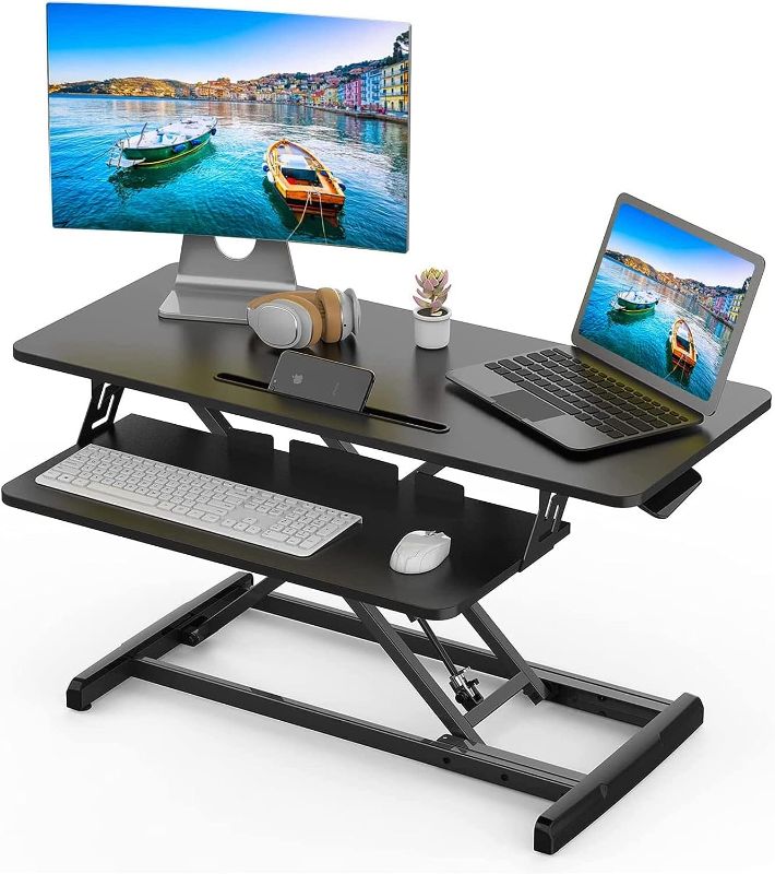 Photo 1 of Smugdesk 36 Inch Adjustable Ergonomic Sitting Standing Convertible Desk Workstation Riser with Keyboard Tray for Home Office, Black