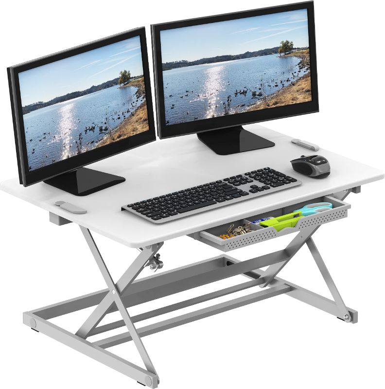 Photo 1 of SHW 32-Inch Height Adjustable Standing Desk Converter Riser Workstation with Drawer, White