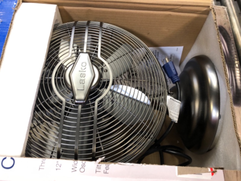 Photo 2 of Lasko 12" Classic Metal Table Fan - 12" Diameter - 3 Speed - Quiet, Carrying Handle, Oscillating - 17.3" Height x 13.3" Width - Metal