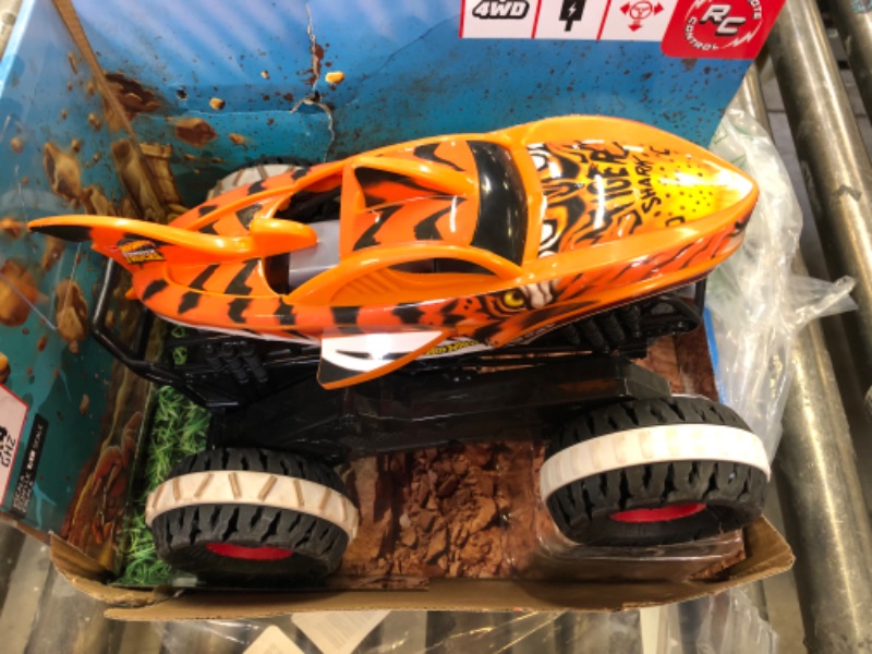 Photo 2 of Hot Wheels Monster Trucks, Remote Control Car, Monster Truck Toy with All-Terrain Wheels, 1:15 Scale Unstoppable Tiger Shark RC