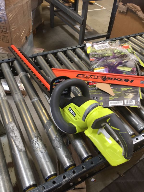 Photo 2 of Ryobi RY40602 40 Volt 24-inch Hedge Trimmer w/Rotating Handle (Bare Tool)