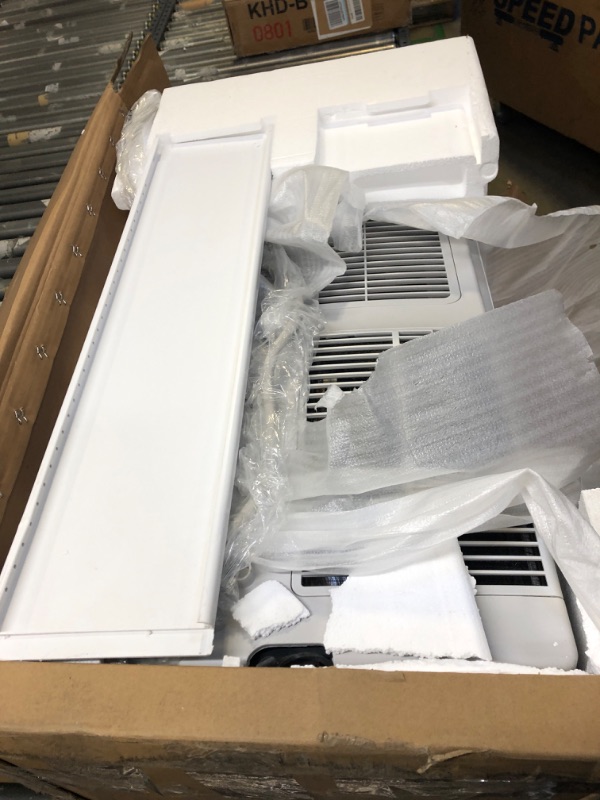 Photo 3 of Amazon Basics Portable Air Conditioner With Remote, Cools 450 Square Feet, 10,000 BTU ASHARE / 6000 BTU SACC, White 6000 BTU Single Hose