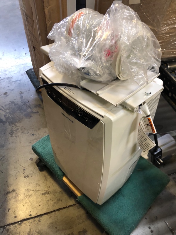 Photo 1 of 14,000 BTU Portable Air Conditioner, Dehumidifier and Fan - Honeywell MN4CFSWW9
