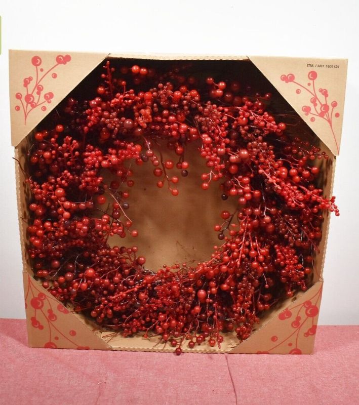 Photo 2 of KIRLAND Holiday 28" Artificial Red Berry Wreath. When fully shaped, this wreath measures 28"L x 7"W x 28"H. Accentuate your space with this festive red wreath. Hang on your door, mantel, or use as a centerpiece decoration surrounded by your favorite Winte