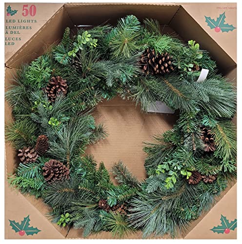 Photo 1 of KIRLAND Pre-Lit Battery Operated 32-Inch Artificial Wreath with Dual Color LED Lights and Greenery. Measures 29-inches, reaches 32-inches when flocked and wreath is stretched to its full length. Decorated with pine cones and various greenery. Accented wit