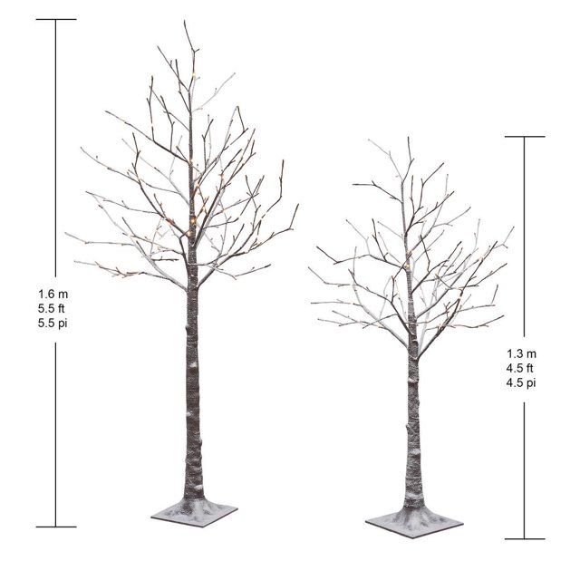 Photo 2 of Flocked LED Birch Tree, Set of 2 Add a unique look to your holiday with this set of two Flocked LED Birch Trees. Holidays, Christmas Illuminated with warm white LED lights that also include 4 different control options. These trees are a perfect addition f