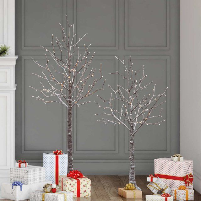 Photo 3 of Flocked LED Birch Tree, Set of 2 Add a unique look to your holiday with this set of two Flocked LED Birch Trees. Holidays, Christmas Illuminated with warm white LED lights that also include 4 different control options. These trees are a perfect addition f