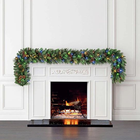 Photo 1 of 9’ Pre-Lit LED Greenery Garland. Features: 90 White / Multi-Color LED Lights. Decorated With Natural Pinecones. Connect up to 4 Garlands Together End-to-End. For Indoor and Outdoor Use. For convenient, yet elegant holiday decorating, this LED 9’ greenery 