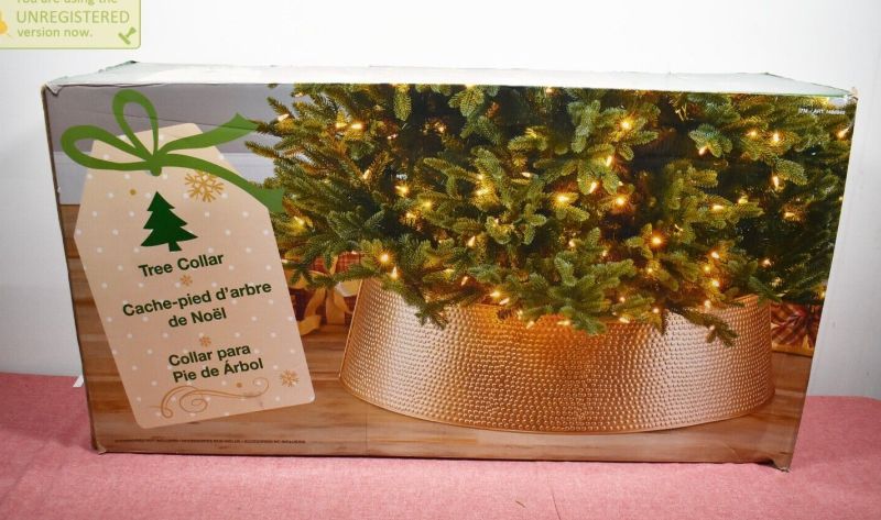 Photo 2 of Holiday Christmas Metal Tree Collar 35" Base x 10" Tall GOLD. rade in that old tree skirt and take the ironing out of hiding and protecting the base of your Christmas tree! Accommodates most trees with its 35” base diameter and 9.84” height. The tree coll