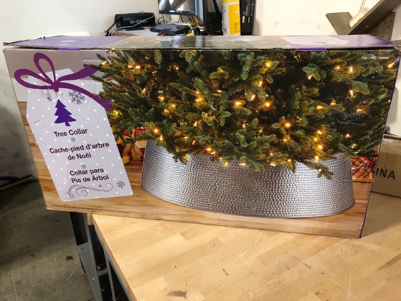 Photo 2 of Holiday Christmas Metal Tree Collar 35" Base x 10" Tall GOLD. rade in that old tree skirt and take the ironing out of hiding and protecting the base of your Christmas tree! Accommodates most trees with its 35” base diameter and 9.84” height. The tree coll