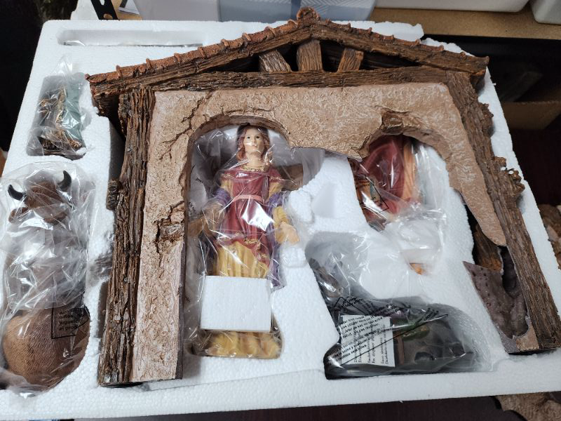 Photo 8 of Kirkland Signature Hand-Painted Christmas Nativity 13-Piece Set. 13-Piece Nativity Set. Hand-crafted and hand-painted with intricate detailing to build each piece. No assembly required. Includes: Manger, Cradle, Baby Jesus, Mary, Joseph, Angel, 3 Wise Men