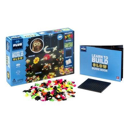 Photo 1 of The Plus-Plus Learn To Build set contains everything you need to get started with this unique construction toy. A Guide Book gives step-by-step instructions to build flat mosaics and 3D creations - animals, people, buildings and more using Glow in the Dar