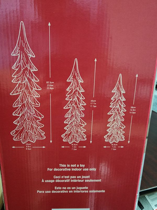 Photo 3 of Costco Holiday Tree Décor (Set of 3). Enhance your holiday home décor with this stunning set of Holiday Tree décor. Featuring three assorted sizes, the modern carved tree designs paired with the chic gold finish makes this set a great addition to any styl