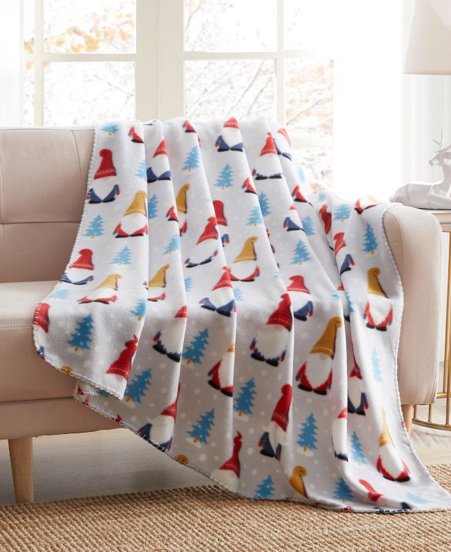 Photo 1 of Morgan Home Holiday Printed Fleece Throw 50 X 60 Inches. Cozy up on your bed or sofa with these fun Holiday inspired throws by Morgan Home. They are perfect for snuggling up in the bed on the couch or around a campfire. Hemmed on all sides for a high-qual