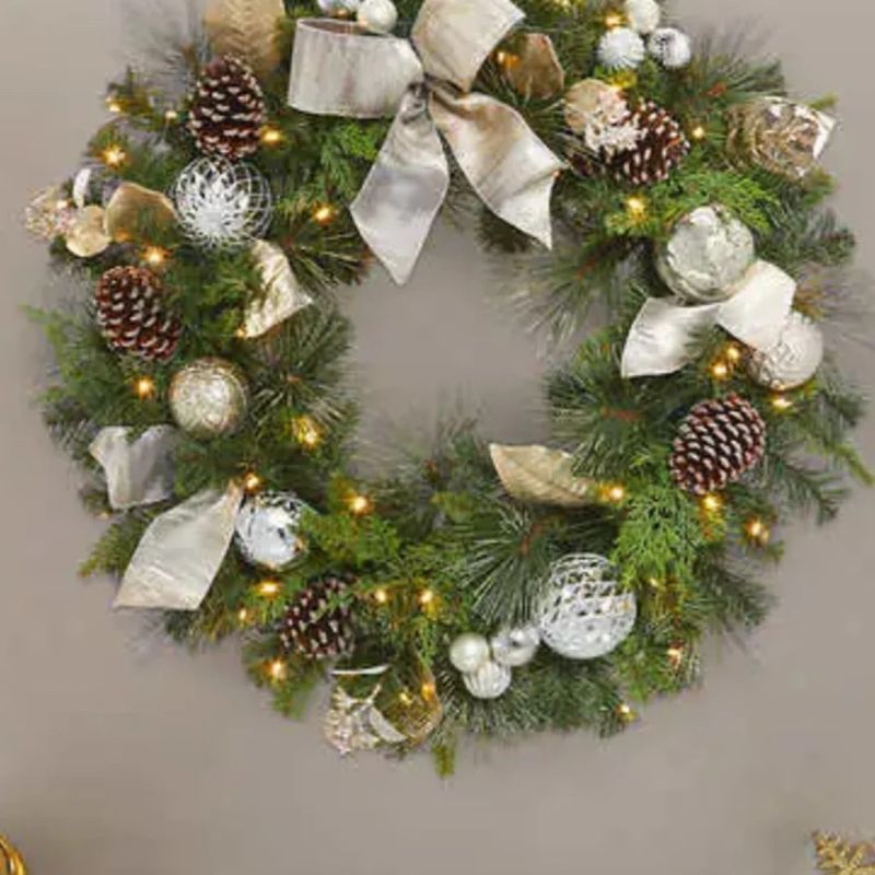 Photo 1 of New 32" Pre-Lit LED Decorated Artificial Wreath - Silver and Gold. 32" Pre-Lit LED Decorated Artificial Wreath - Silver and Gold
Celebrate the season with this classic holiday wreath. Faux pine is elevated with an elegant array of mixed metallic ornaments