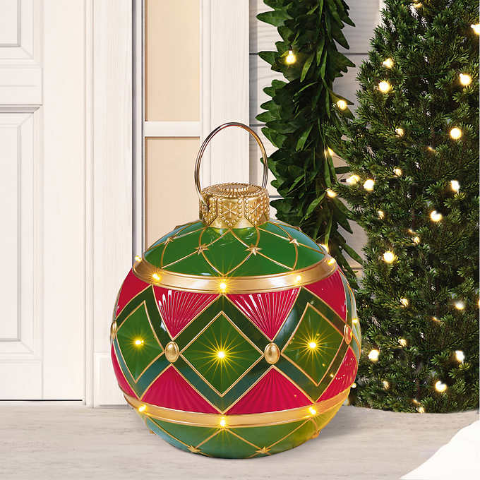 Photo 1 of 20" Oversized Christmas Ornament Green and Red with LED Lights Diamond. The Oversized Christmas Ornament Green and Red with LED Lights Diamond is a handcrafted oversized decorative ornament with LED lighting will provide festive accents for your porch yar