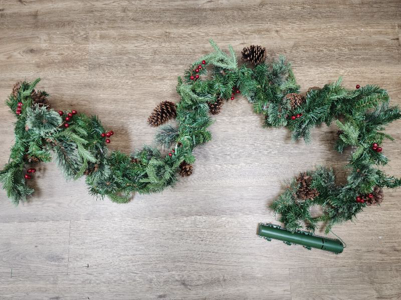 Photo 1 of 9’  Greenery Garland. Features:  Decorated With Natural Pinecones. Connect up to 4 Garlands Together End-to-End. For Indoor and Outdoor Use. For convenient, yet elegant holiday decorating, this garland with natural pinecones will add a warm festive feel t
