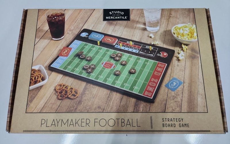 Photo 3 of Studio Mercantile Football Playmaker Strategy Board Game Set. The Studio Mercantile football strategy board is a game. Design plays and draw cards to advance the game and see who could be the next great coach on Sundays. 1 game board 1 mini bean bag 4 sco
