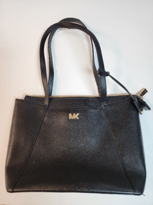 Photo 1 of MICHAEL MICHAEL KORS Maddie Medium Crossgrain Leather Tote Bag, A signature for every day, the Maddie is an always-chic tote bag with a minimalist design and luxe leather craftsmanship. Punctuated by refined logo detailing, this carryall features convenie